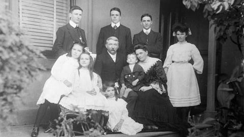 Family group on a verandah, c 1912; photo by Mark James Daniel